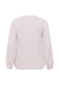 Blusa de manga larga rosa claro con un patrón texturizado, escote en forma de V y puños fruncidos. Tejido suave y ligero con un corte relajado.