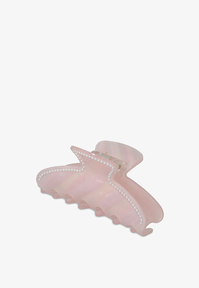 Haarclip in Pink, aus glänzendem Kunststoff, mit welligem Design, sechs Zähnen und einem perlenähnlichen Akzent entlang der Kante.