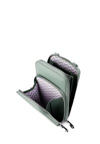 Green leather wallet with zigzag patterned interior, featuring multiple compartments, zippers, and a smooth texture. Compact design.