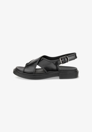 Sandalia negra con un diseño elegante de tiras cruzadas en piel suave. Cuenta con una suela gruesa y texturizada, y una hebilla ajustable en el tobillo para un mejor ajuste.