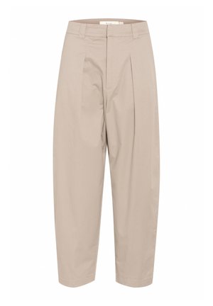 Beige, Baumwollmischung-Hosen mit lockerem Schnitt, featuring vorderen Falten, einem elastischen Bund und verkürzten Beinen. Schlichtes Design, keine Muster oder Akzente.