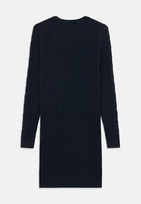 Vestito maglione in maglia a trecce blu navy con maniche lunghe, polsini e orlo a coste, caratterizzato da un motivo testurizzato su tutto il tessuto.