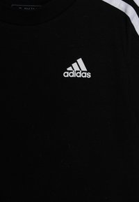 adidas Performance TEE - Camiseta estampada - black/white