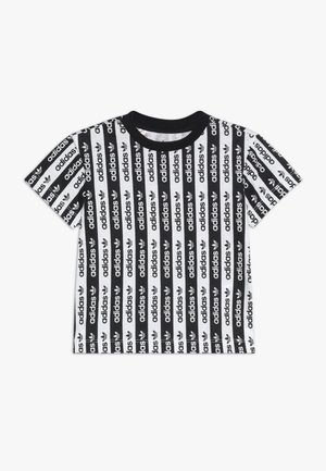 Short-sleeve black and white Adidas T-shirt with alternating vertical stripes featuring the Adidas logo and trefoil pattern.