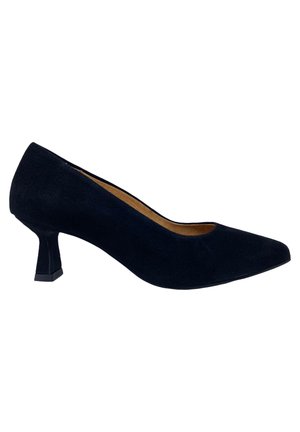 Sorte ruskindspumps med spids tå og en 4 cm kitten heel. Har en glat overflade og en kontrasterende lysebrun indersål.