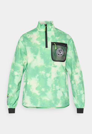 Green tie-dye pullover with a high collar, half-zip front, and a black mesh pocket featuring a logo. Cuffs are fitted with black trim.