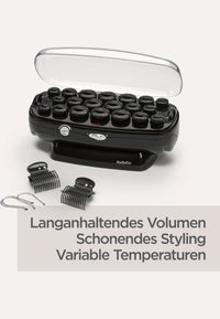 Fasce riscaldate nere per capelli in un contenitore, con forme rotonde e un coperchio trasparente. Include clip per acconciature e impostazioni di temperatura variabili.