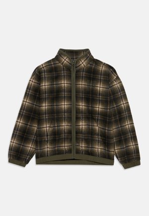 Veste à carreaux olive et bruns, avec fermeture éclair sur le devant, col montant, manches longues, poignets et ourlet élastiqués.