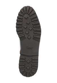 Black rubber shoe sole with deep grooves and a textured surface. Features a diamond pattern for traction and durability.