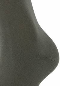 Olivgrüne Knöchel-Socke, aus glattem, dehnbarem Material, mit gerippter Textur und konturiertem Design für eine enganliegende Passform.