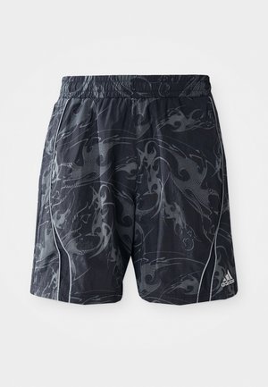 Black athletic shorts with a gray flame pattern, elastic waistband, side stripes, and logo label on the lower right. Lightweight fabric.