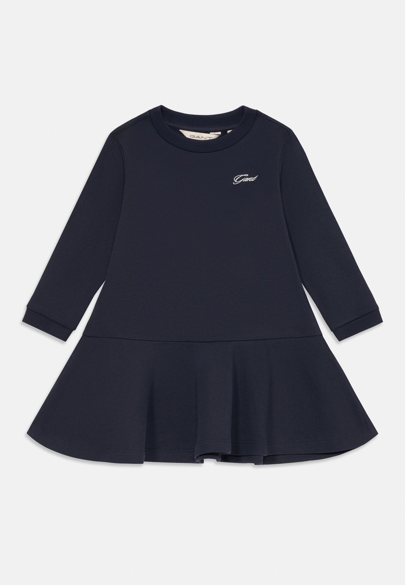 Robe pour enfant en bleu marine à manches longues avec jupe évasée et petit logo "Gant" brodé sur la poitrine gauche.