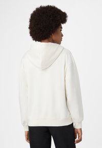 Fila APPAREL LAGRIO  - Vetoketjullinen college - egret