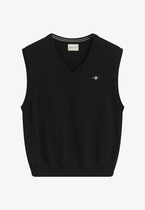 Pull noir sans manches avec un col en V, présentant un col côtelé et un petit logo sur la poitrine. Matière en tricot douce.