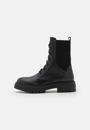 IRIDEA - Stivaletti con plateau - black