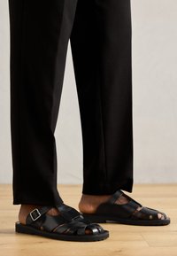 Slip-on sandaler - black