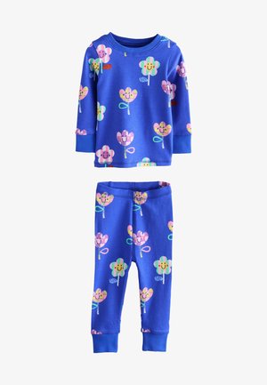Completo pigiama di cotone blu composto da maglia a maniche lunghe e pantaloni abbinati. Il motivo include fiori sorridenti e lecca-lecca colorati. Tessuto morbido.
