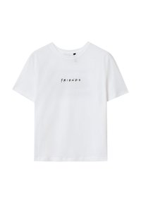 T-shirt bianca in cotone, con maniche corte e collo rotondo, stampata con la parola "FRIENDS" in font corsivo nero sul petto.