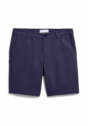 Marineblaue Freizeitschuhe mit Knopf- und Reißverschluss, Gürtelschlaufen, Seitentaschen und Markenetikett auf der rechten vorderen Tasche.