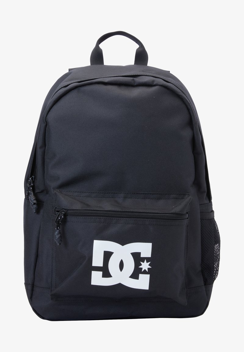 Black backpack made of durable fabric with a front zippered pocket and mesh side pocket; features a prominent white DC logo.
