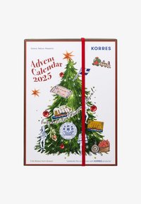 Advent calendar 2025 with a decorated Christmas tree, Greek-themed ornaments, and red elastic band from Korres brand.