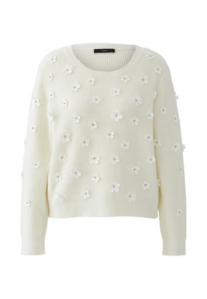 Cream-colored ribbed sweater with long sleeves, adorned with small white 3D flower appliques and silver bead centers throughout.
