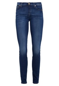 Slim-fit mörkblå denimjeans med blekta detaljer, femficksdesign, dragkedja med knappstängning och diskreta sömmar.