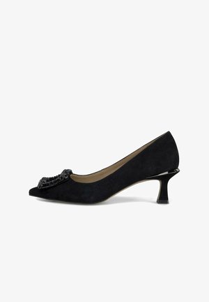 Escarpin en daim noir avec bout pointu et accent décoratif en perles noires. Dispose d'un petit talon évasé et d'une doublure intérieure lisse.