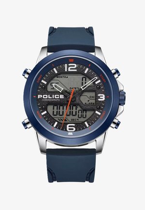 Digitálne a analógové hodinky s modrým gumovým remienkom, strieborným nerezovým puzdrom, textúrovaným čiernym ciferníkom, oranžovými akcentmi a viacerými funkčnými tlačidlami.