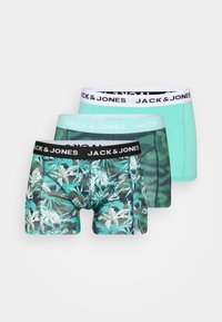 Drei Paar Boxershorts: eine einfarbig mintgrün, eine mit grünem Blattmuster auf schwarz und eine mit einem dunkelgrünen und schwarzen Netzdesign.