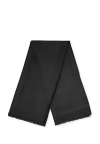Bufanda negra con una textura suave, que presenta sutiles patrones en relieve. Los bordes están desflejados, con una forma rectangular adecuada para colgar.