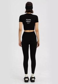 Misaga MOVEMENT SEAMLESS - Legging - black