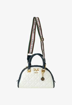 Quilted handbag in white and navy leather, featuring gold hardware, double handles, and a detachable striped strap with green and red accents.
