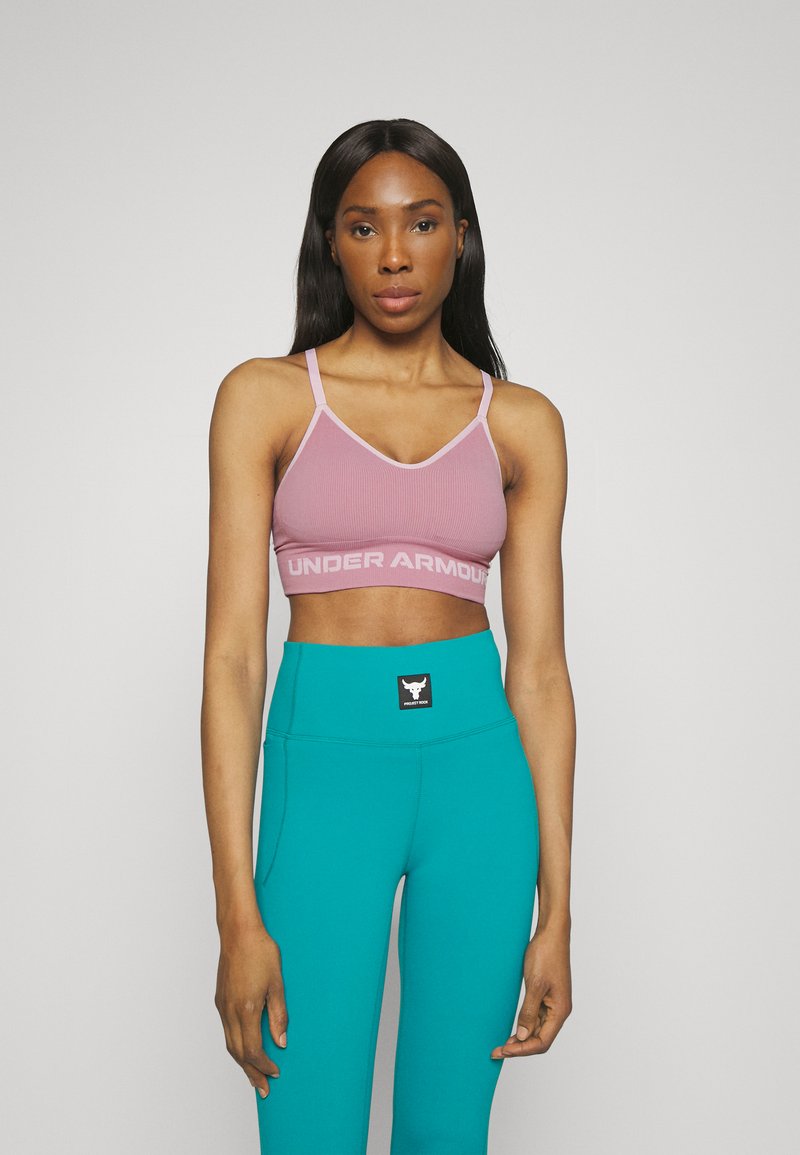 Under Armour SEAMLESS LOW Light support sports bra pink elixir/pink sugar/pink Zalando.co.uk
