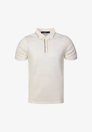 Polo blanc à manches courtes avec col, patte de boutonnage à deux boutons, détails noirs et logo discret sur la poitrine gauche.
