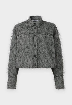 Zwart en grijs visgraat cropped jasje met knopen aan de voorkant, lange mouwen en een klassieke kraag, voorzien van een gestructureerde fuzzy afwerking.