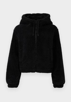 Sort cropped hoodie lavet af fluffy, struktureret stof. Har lynlåslukning, to forlommer og justerbare snore ved hætten.