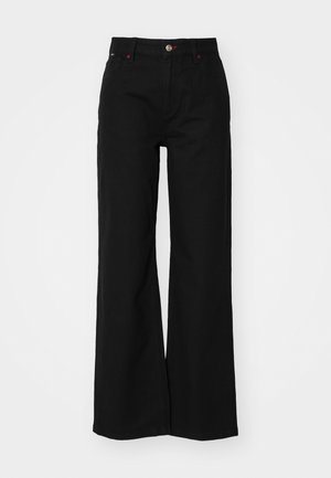 Black wide-leg pants made from denim with a high waist, featuring a front fly zipper, button closure, and red accent stitching.