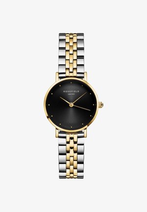 Reloj de pulsera bicolor con una pulsera de metal dorada y plateada, una esfera redonda negra, textura en relieve y marcadores de hora dorados. Nombre de la marca: Rosefield.
