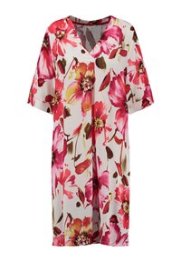Floral Tunika-Kleid aus leichtem Stoff mit V-Ausschnitt, kurzen Ärmeln und leuchtend pinken und gelben Blumen auf weißem Hintergrund. Lockerer Schnitt.