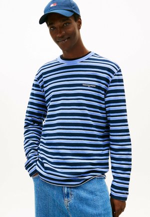Gestreepte T-shirt met lange mouwen in donkerblauw en lichtblauw, met een ronde hals en geborduurd 'tommy jeans' logo op de borst.