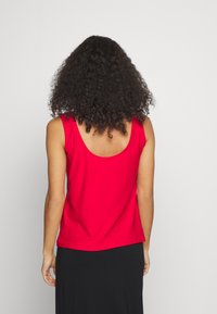 ONLY Petite ONLNIDA - Top - mars red