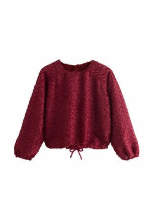 Pulover burgund cu un model texturat în zig-zag, guler rotund și șnur la tiv, având mâneci lungi și puffate.