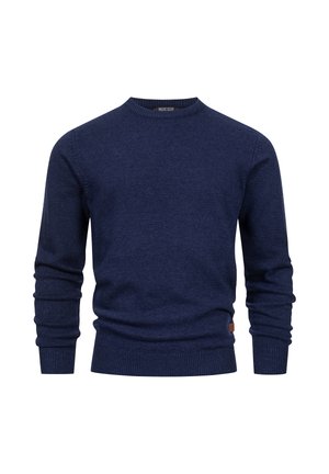 Marineblå strikkegenser med rund hals, ribbestrikkede mansjetter og kant, myk tekstur og subtil logoakcent på den nedre siden.