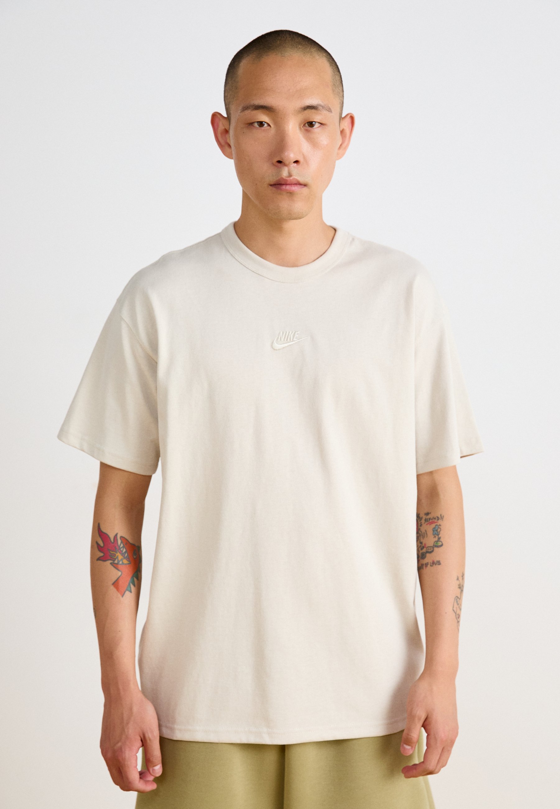 light brown nike shirt