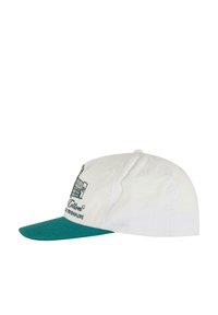 Cotton baseball cap with a white crown and teal brim, featuring printed black graphics. Structured design with a button at the top.