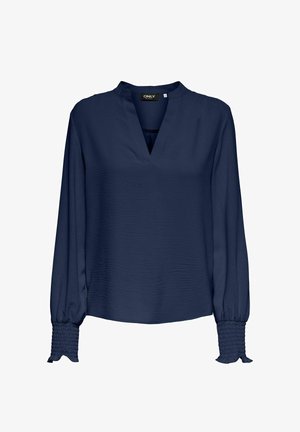 Tumesinine pika varrukaga pluus V-kaelusega, seisev krae ja soonikkoes elastsete varrukaotstega, mis on kaunistatud volangidega.