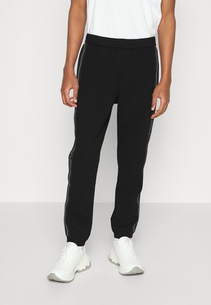 TROUSER - Tracksuit bottoms - black