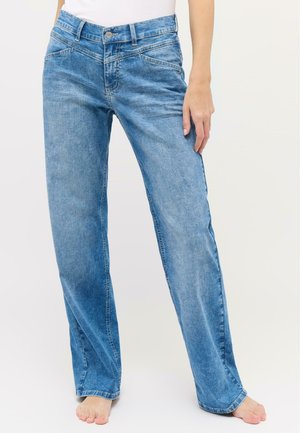 Light blue denim jeans with a relaxed fit, straight legs, and front pockets. The waistband features a metal button and belt loops.