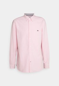 Camicia a maniche lunghe di colore rosa chiaro in cotone, con colletto abbottonato e piccolo logo ricamato sul petto a sinistra.
